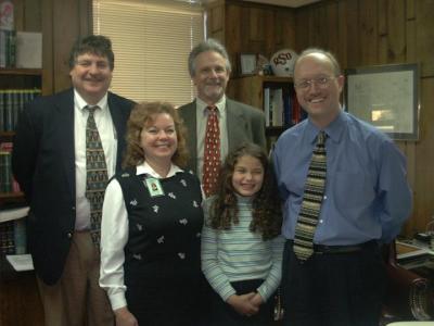 Hannah with lawyers and judge on adoption day!