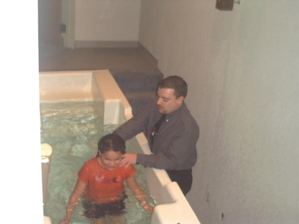 Hannah being baptized (Daddy is trying unsuccessfully not to cry)